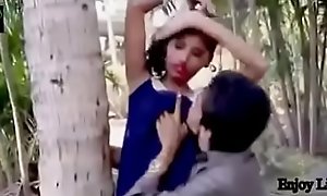Indian Teen kissing at one's silence garden