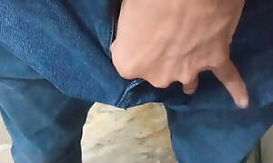 Indian young boy showing his locate from jeans and Cumming out