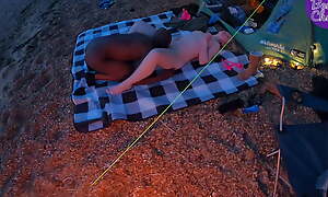 Young white-headed hotwife fucks her BBC bull while in one's own time camping with husband