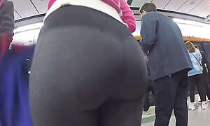 Candid Asian lady's aggravation in tight yoga pants