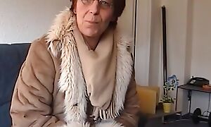 A horny German granny pleasing a bushwa relating to her pussy increased by mouth almost POV