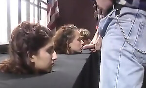 Whores getting their throats fucked in a blowbang