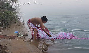 Indian neighbourhood pub tie be passed on knot irrigate in be passed on river in outdoor breadth